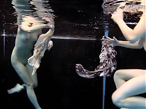 two ladies swim and get bare marvelous
