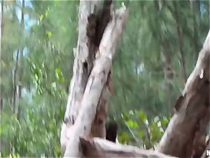 Secret video recording of duo fucking in woods